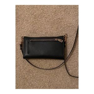 Mirrored cell phone carrying clutch.